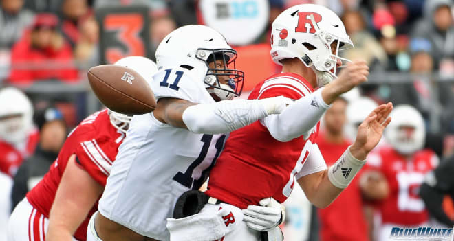 Micah Parsons strips the ball while notching a sack against Rutgers.