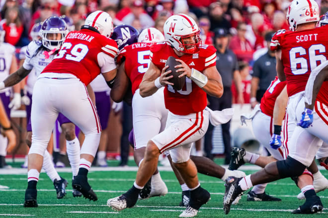 Oct 21, 2023; Lincoln, Nebraska, USA; Nebraska Cornhuskers quarterback Heinrich Haarberg (10) runs with the ball against the Northwestern Wildcats during the third quarter at Memorial Stadium. Mandatory Credit: Dylan Widger-USA TODAY Sports