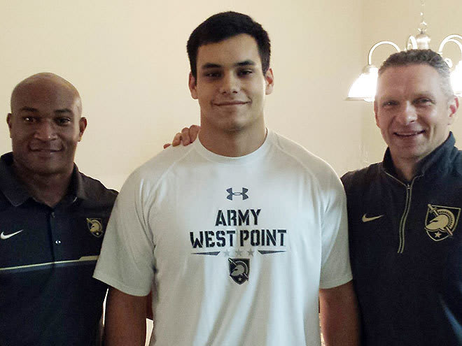 Army commit & LB Jeremiah Lowery surrounded by LB coach Daryl Dixon and head coach Jeff Monken