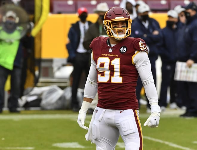 Washington Football Team defensive end Ryan Kerrigan (91) reacts after recording a sack against the Dallas Cowboys during the second half at FedExField. 