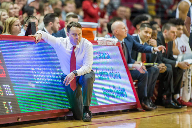 Indiana head coach Archie Miller kneels during his team's game against Princeton. (USA Today Images)