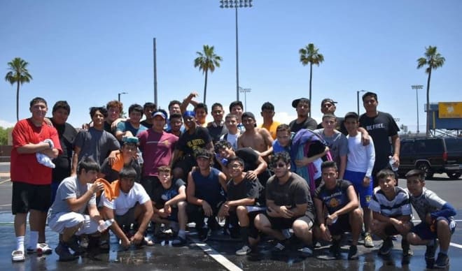 Carl Hayden players pose for a picture following their annual Car Wash Fundraiser in the parking lot of the stadium on May 11.  The Falcons will be inside that stadium on Aug. 23 for the opener against Cactus Shadows. (Photo Courtesy of Steven Arenas)