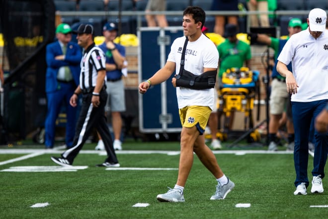 Notre Dame quarterback Tyler Buchner with his sling on display before ND's Sept. 17 win over Cal.