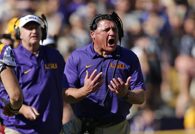 LSU head coach Ed Orgeron yelling on the sidelines.