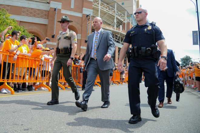 Knoxville authorities preemptively take Mister Jeremy Pruitt downtown for questioning for some future assaults or disorderly conducts in Knox County. It's a matter of time, right?