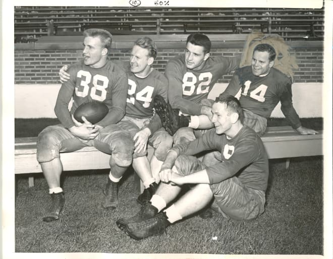 Jim Martin (38), Larry Coutre (24), Leon Hart (82) and Emil Sitko (14) arrived with the 1946 class. Up front is quarterback Bob Williams.