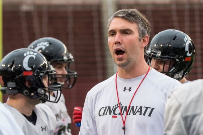 Gino Guidugli starred as a player at the University of Cincinnati and later honed his coaching skills there. 