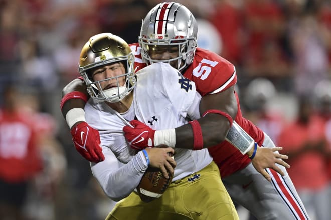 Irish sophomore quarterback Tyler Buchner was sacked three times at Ohio State on Saturday night but showed poise and persistence in  his starting debut.