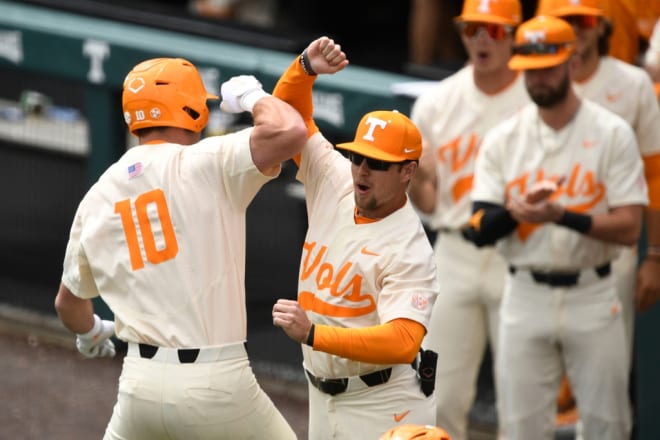 Tennessee's Griffin Merritt (10) and Logan Chambers (7) celebrate Merritt's home run against Vanderbilt during the NCAA baseball game in Knoxville, Tenn. on Sunday, April 23, 2023. 