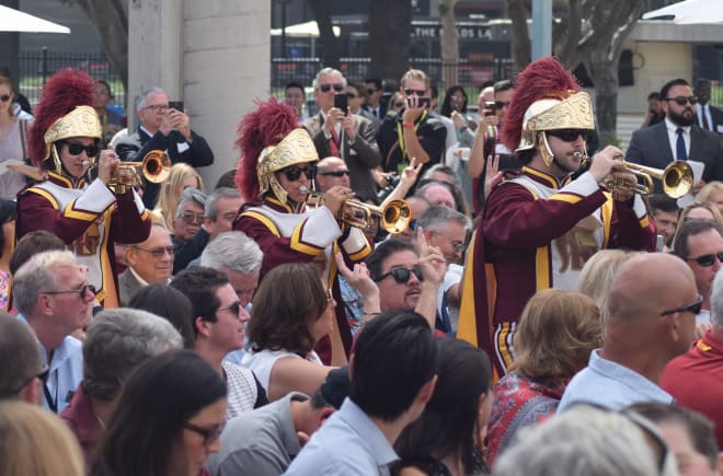 The USC marching band arrives to start the fesitivities Thursday.