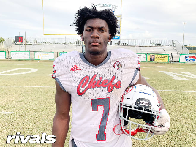 R Mason Thomas gives details to his Miami Hurricanes official