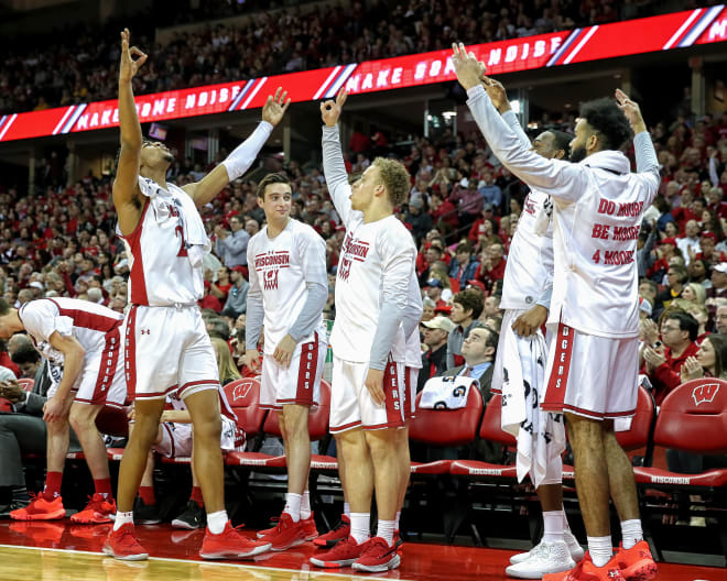 Aleem Ford (2) and the Wisconsin bench celebrate during the Badgers' 71-69 victory over Minnesota Sunday.