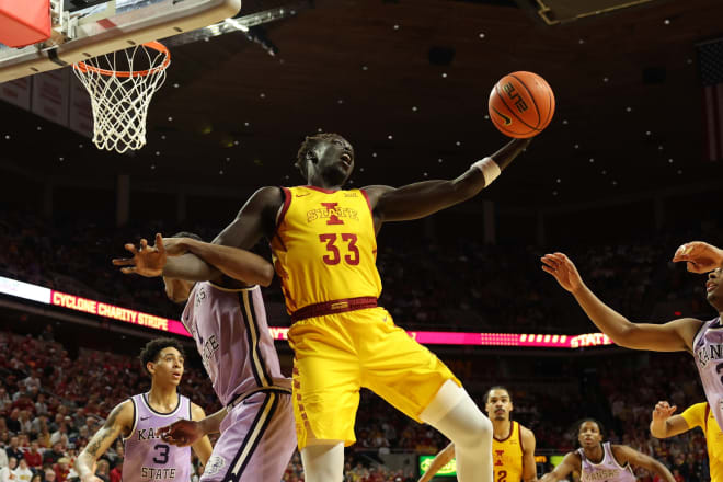 Omaha Biliew grabs a rebound against Kansas State this past season. 