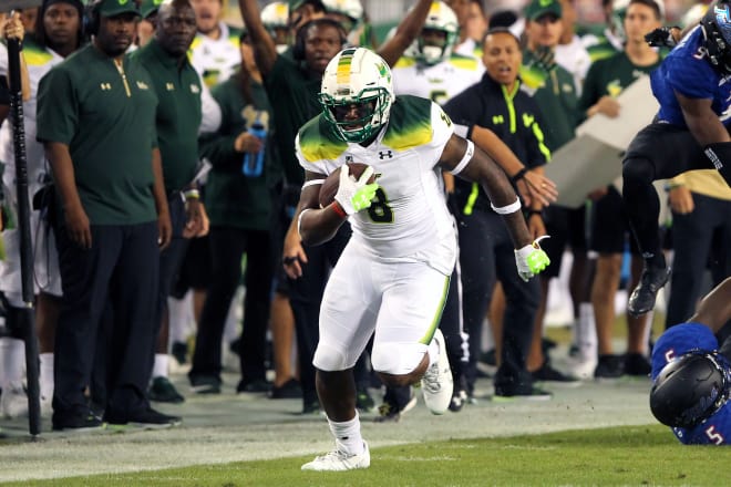Tyre McCants (8) of USF makes the catch and then runs to the end zone for the score during the game between the Tulsa Golden Hurricane and the USF Bulls on November 16, 2017, at Raymond James Stadium in Tampa, FL.