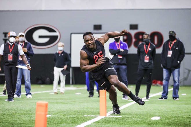 Monty Rice runs through a drill at Georgia's pro day. (Tony Walsh/UGA Sports Communications)