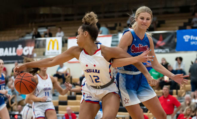 Indiana All-Stars Mila Reynolds (12) pushes past Junior All-Star McKenna Layden (11) on Wednesday, June 8, 2022, at Mt. Vernon High School in Fortville. High School Indiana All Stars Boys And Girls Game