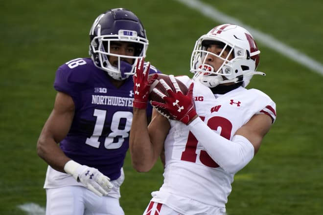 Chimere Dike hauls in a reception against Northwestern.