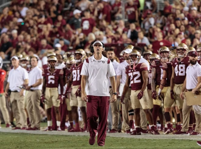 FSU football coach Mike Norvell looks for a replay on the big screen last Saturday night.