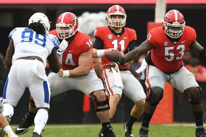 Ben Cleveland (74) and Lamont Gaillard (53) did an excellent job of protecting Jake Fromm.