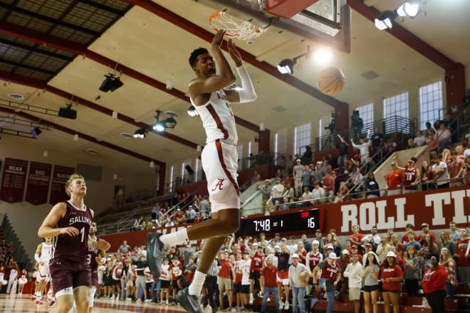 Alabama forward Brandon Miller (24) throws down a dunk during the team's charity exhibition against Southern Illinois on Oct. 29. Photo | Alabama Athletics 