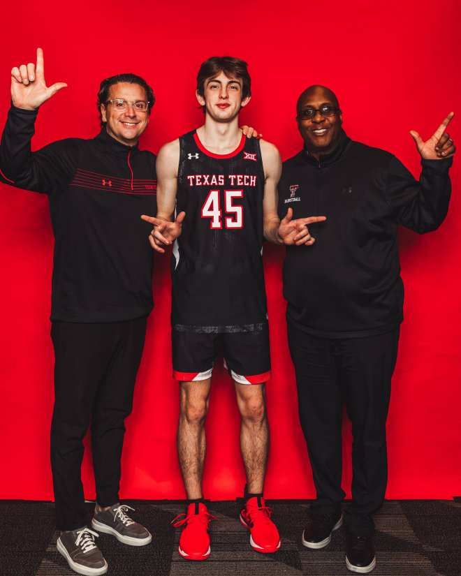 Drew Steffe with Texas Tech assistant coaches Barret Peery and Corey Williams