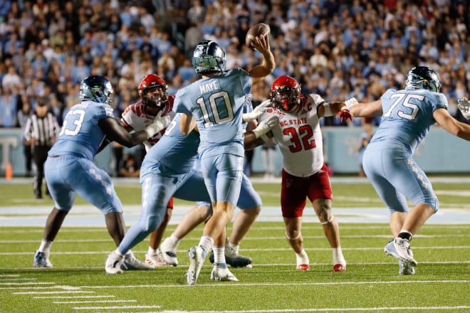 UNC quarterback Drake Maye attempts a pass versus NC State.