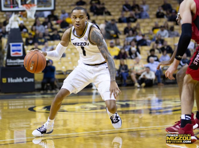 Xavier Pinson scored 19 of his 22 points in the second half to help Missouri beat No. 21 Oregon in Omaha.