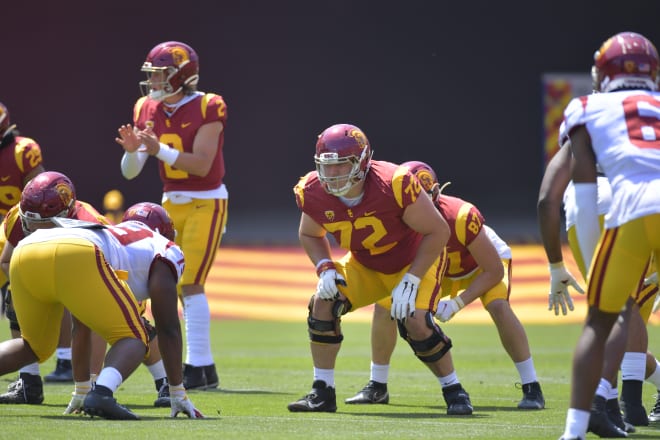 With USC shuffling its offensive line to create even teams, some guys were in different positions like Andrew Vorhees playing left tackle instead of his usual guard spot.
