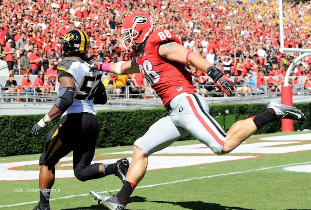 Michael Sam scooped up a fumble forced by fellow defensive end Shane Ray and scored from 20 yards out to pad Missouri's lead against No. 7 Georgia on Oct. 12, 2013.