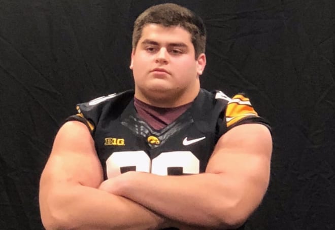 Offensive lineman Ben Hoitink made a visit with the Iowa Hawkeyes on Sunday.