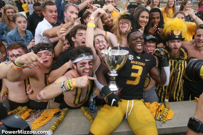 Safety Ronnell Perkins poses with the Mayors' Cup after Missouri's first win over South Carolina since 2015.