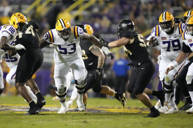 LSU offensive lineman Lance Heard (53) blocks in the second half of an NCAA college football game against Army in Baton Rouge, La., Saturday, Oct. 21, 2023. LSU won 62-0.