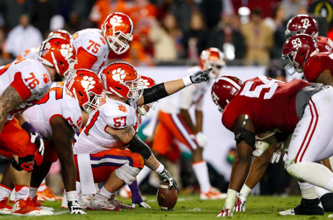 TAMPA, FL - JANUARY 09: Center Jay Guillermo #57 of the Clemson Tigers at the line of scrimmage during the 2017 College Football Playoff National Championship Game against the Alabama Crimson Tide at Raymond James Stadium on January 9, 2017 in Tampa, Florida. The Clemson Tigers defeated The Alabama Crimson Tide 35 to 31. (Photo by Don Juan Moore/Getty Images)