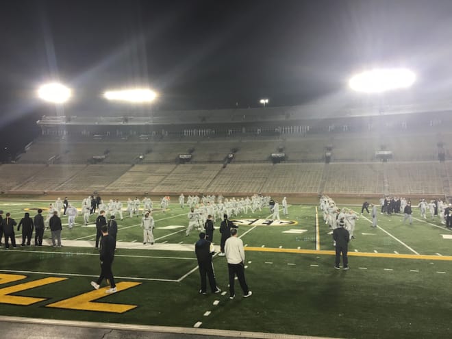 The Tigers gather on Faurot Field at 5:30 in the morning