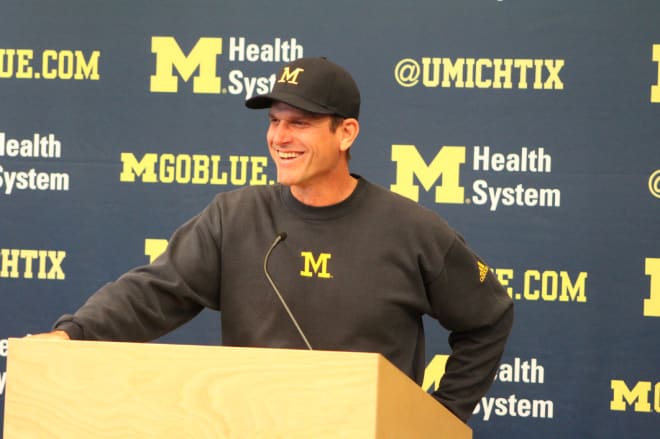 Michigan Wolverines head football coach Jim Harbaugh is 2-2 against Wisconsin.