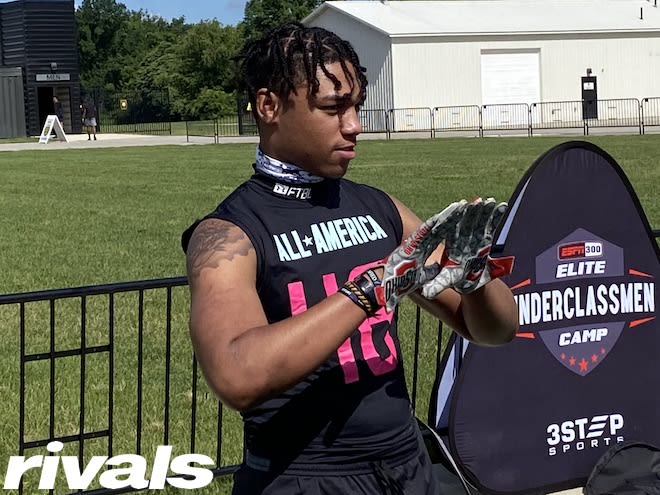 Five-star LB Shawn Murphy shows off his Ohio State gloves at a recent camp