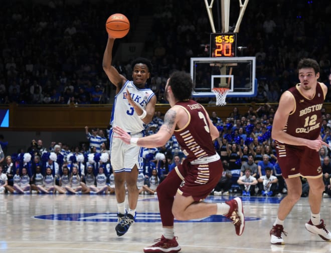 Duke's Jeremy Roach throws a pass over BC's defense. 