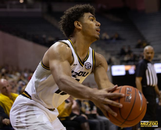 Mark Smith hit four three-pointers and scored 19 points in the Missouri win