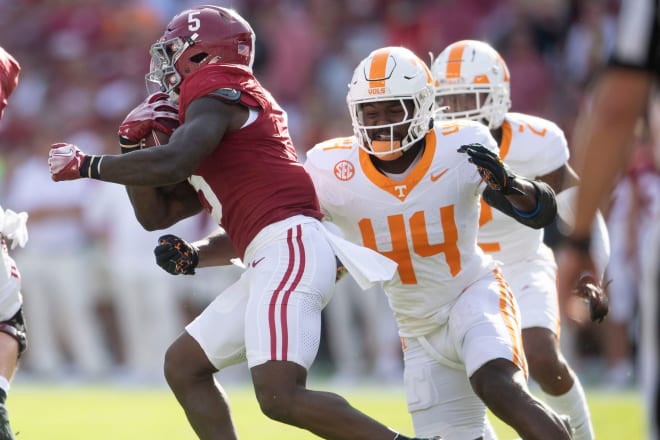 Alabama running back Roydell Williams (5) is pursued by Tennessee linebacker Elijah Herring (44) during a football game between Tennessee and Alabama at Bryant-Denny Stadium in Tuscaloosa, Ala., on Saturday, Oct. 21, 2023.