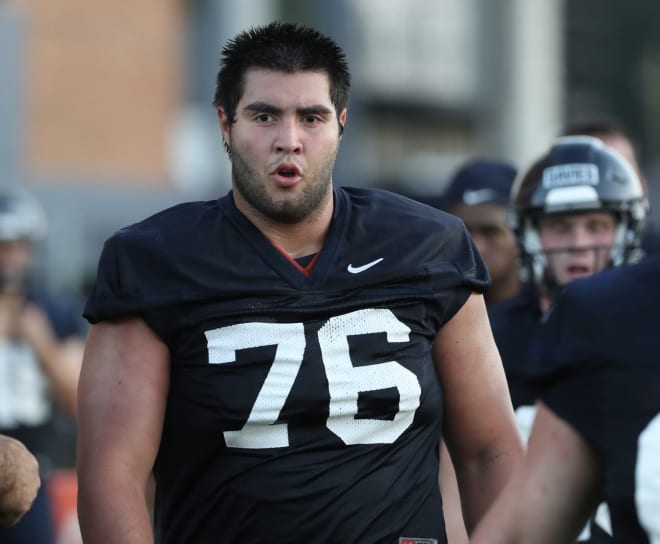 Former Dartmouth standout John Paul Flores figures to be a big piece for UVa's revamped O-line.