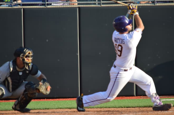 Travis Watkins hammers one of his two Senior Night home runs in ECU's victory over Campbell.