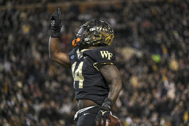 Wake Forest's Justice Ellison celebrates a touchdown. 