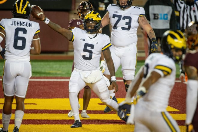 Michigan Wolverines football quarterback Joe Milton made an impression in his first start at Minnesota.