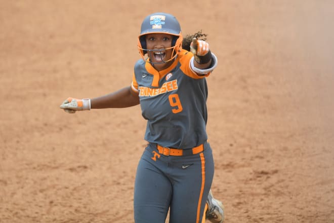 Tennessee outfielder Kiki Milloy points to her family in the stands after hitting a home run during the Lady Vols' NCAA Regional at Sherri Parker Lee Stadium.