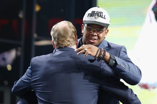 Marcus Davenport gets a hug from NFL Commissioner Roger Goodell after being drafed by the New Orleans Saints in the first round of the 2018 draft