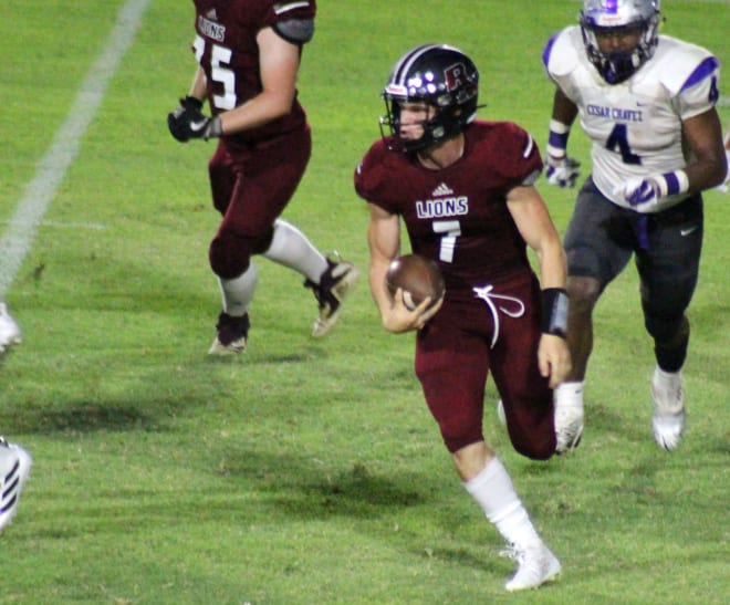 Red Mountain QB Hyrum Boren takes off on a run during a home game from last August.  The Mountain Lions (12-1) have just one blemish, a quadruple-overtime loss to Perry.