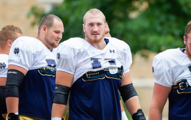 Notre Dame fifth-year senior offensive linemen Tommy Kraemer and Liam Eichenberg prior to a practice
