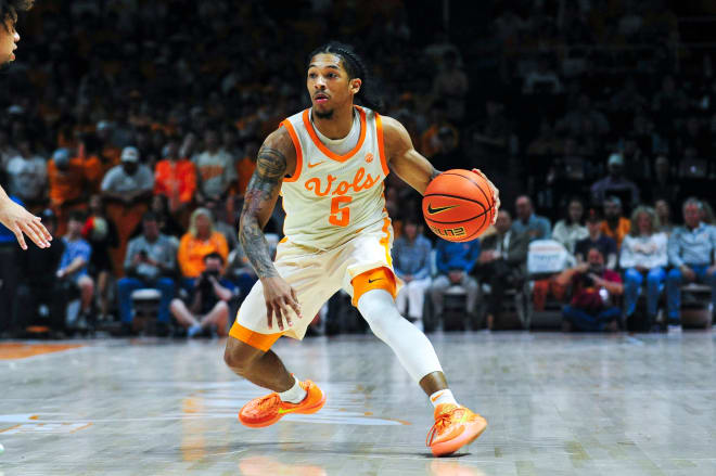Tennessee guard Zakai Zeigler (5) dribbles the ball during a NCAA game at Thompson-Boling Arena at Food City Center in Knoxville, Wednesday, Feb. 28, 2024. Tennessee won 92-84 against Auburn.