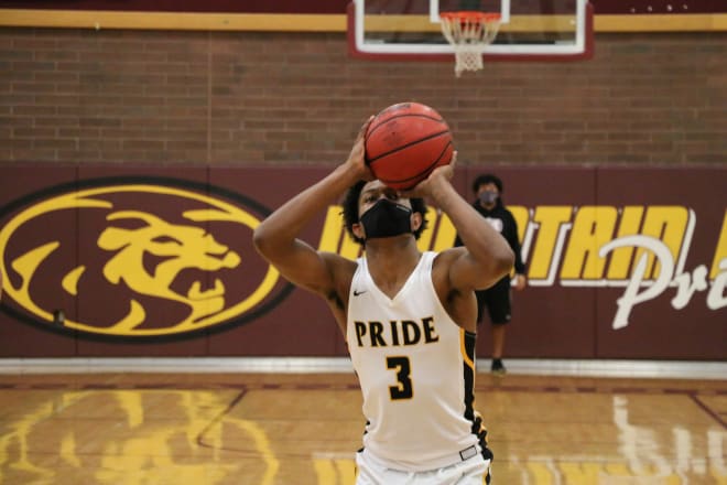 Sophomore Roosevelt 'Tru' Washington shoots for Mountain Pointe basketball.