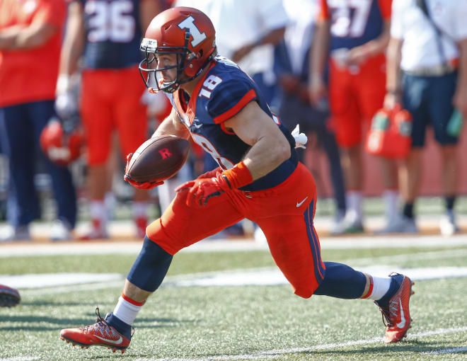 Mike Dudek #18 of the Illinois Fighting Illini runs the ball during the game against the Rutgers Scarlet Knights at Memorial Stadium on October 14, 2017 in Champaign, Illinois.